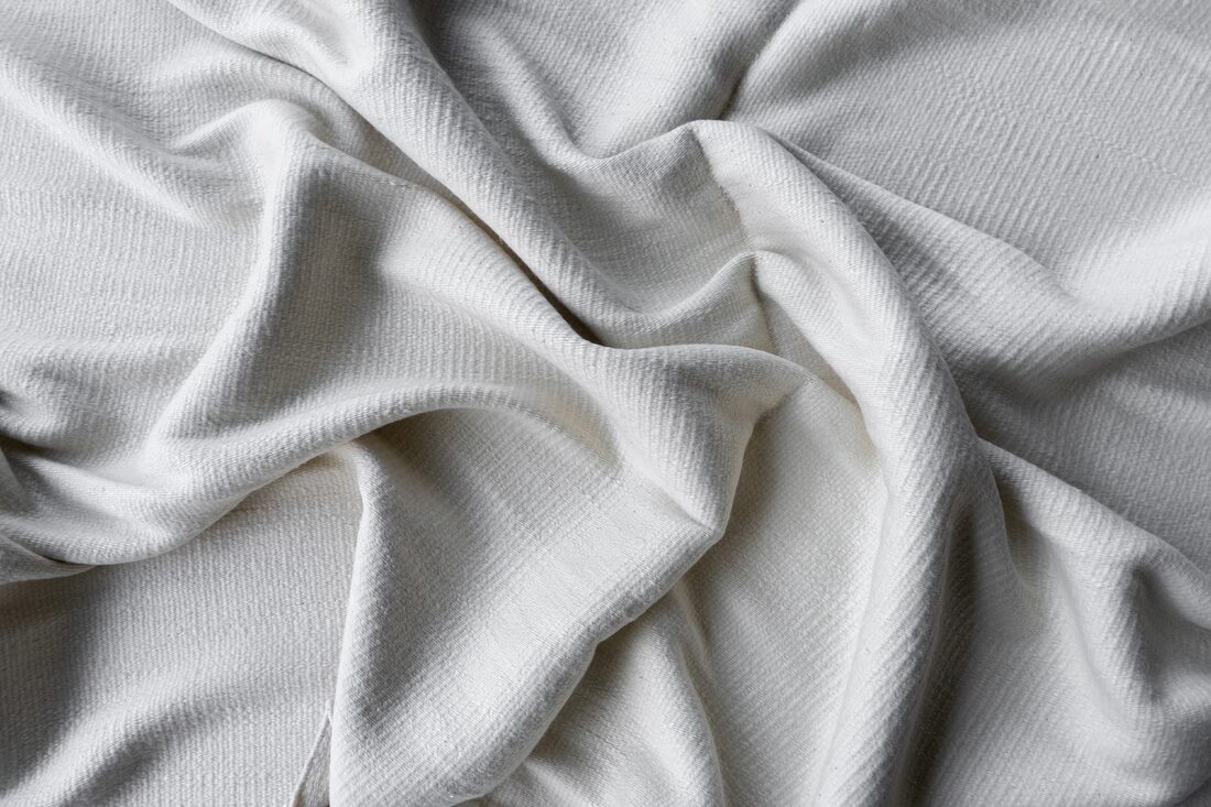 Tibetan Wool vs. New Zealand Wool: A Designer's Guide to Rug Wool
