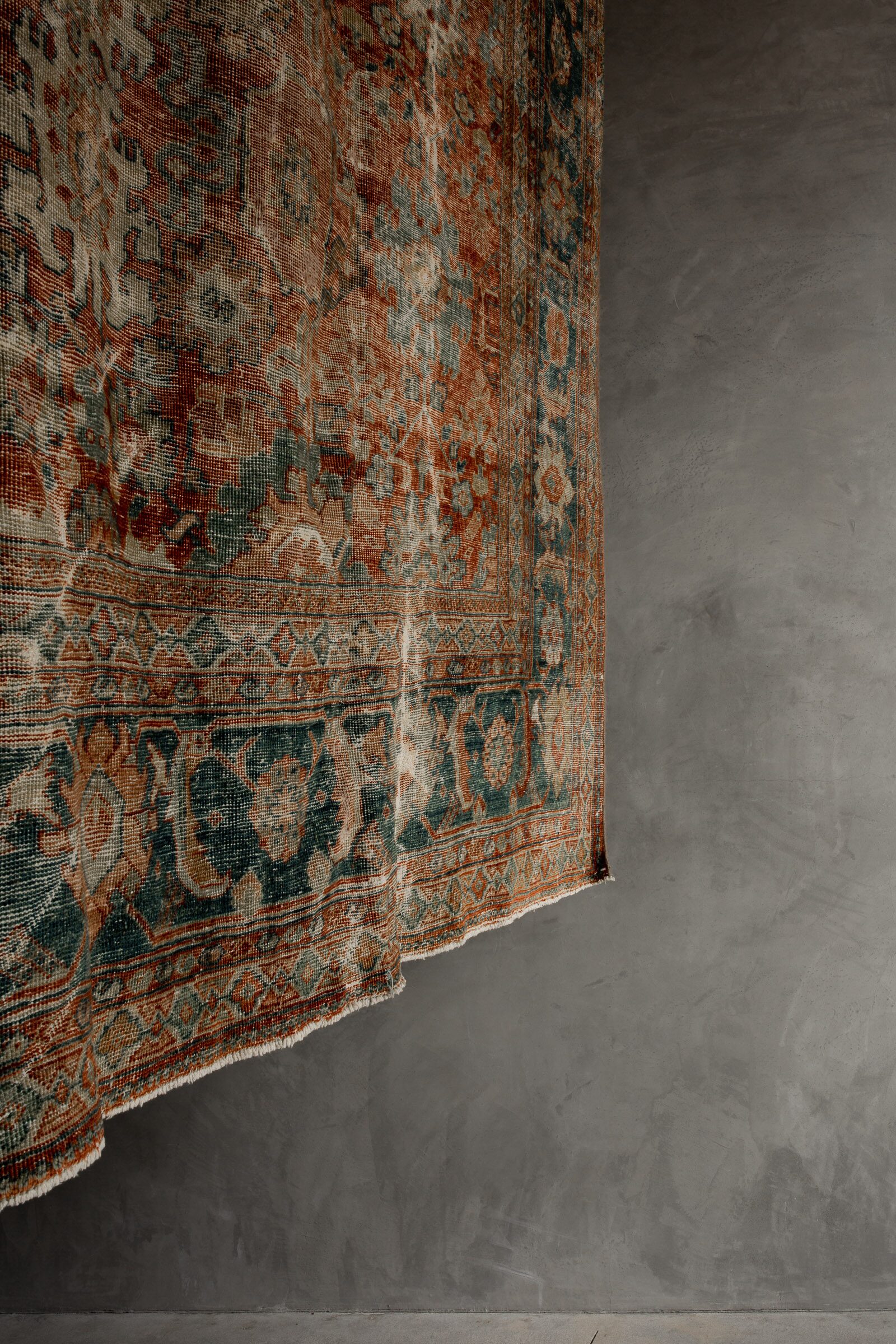Learn how to distinguish beautiful age-related character from fading, pile loss, structural weakness, pests, and risky repairs in an antique rug.