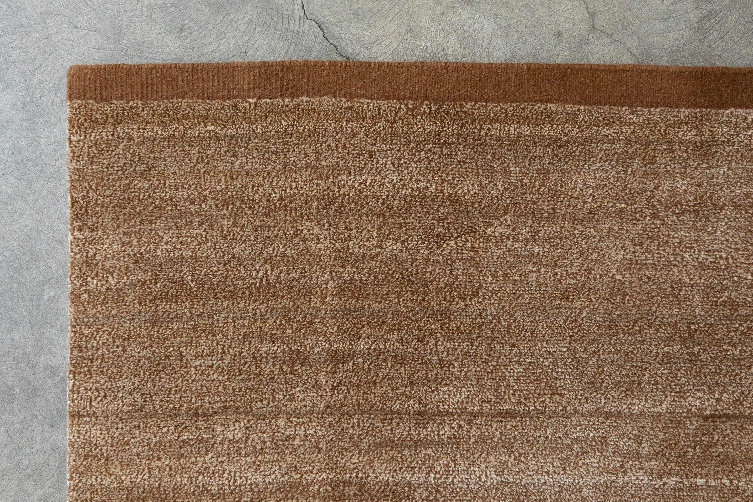 ALLO/WOOL - DARK BRONZE rug from the textures series by WOVEN