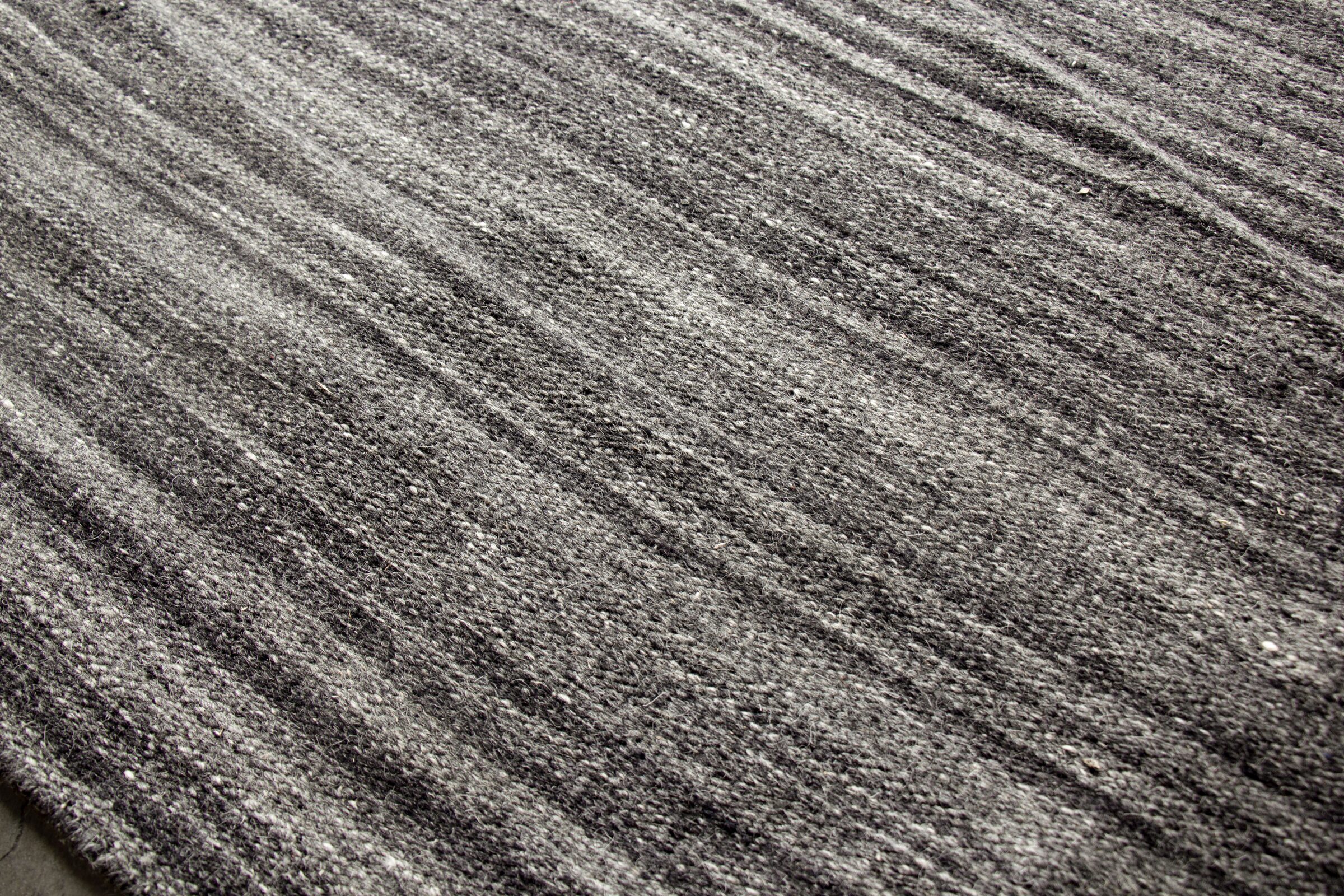 MODERN KILIM - BLACK rug from the modern kilim series by WOVEN