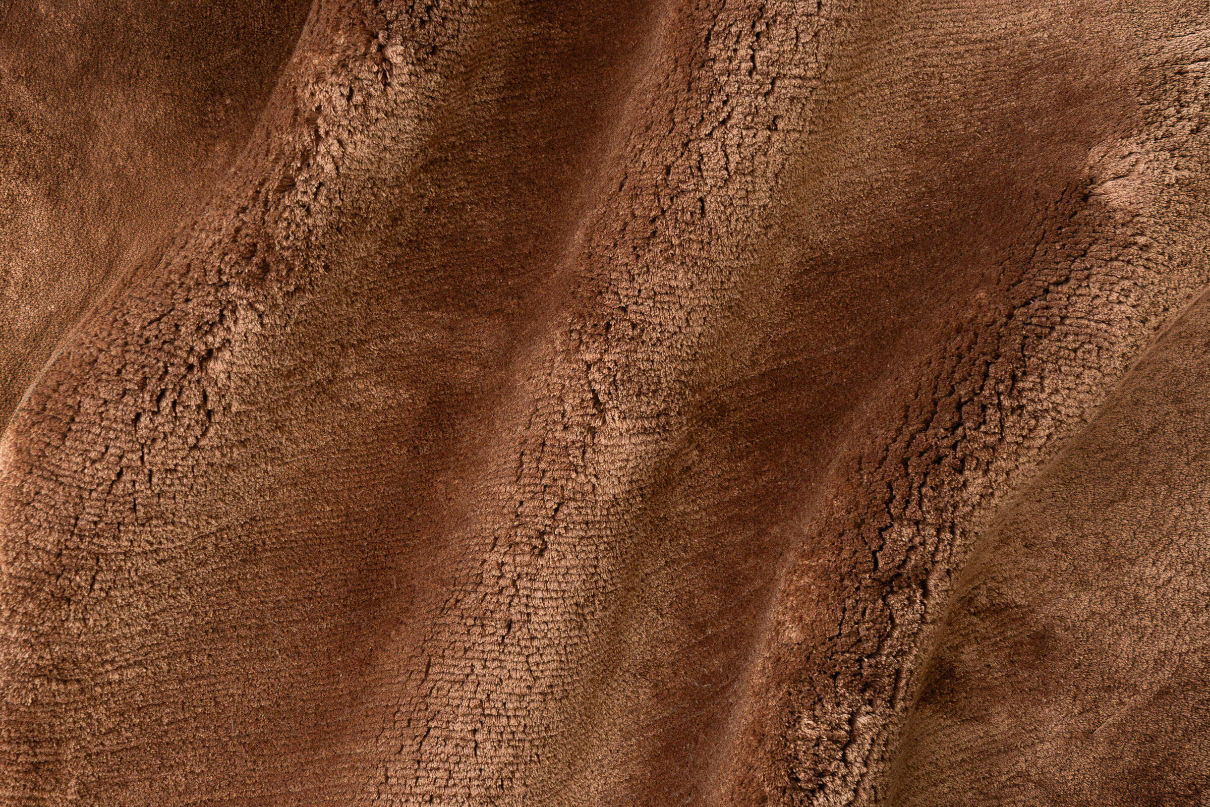 SHEARED SILK - RUST rug from the sheared silk series by WOVEN