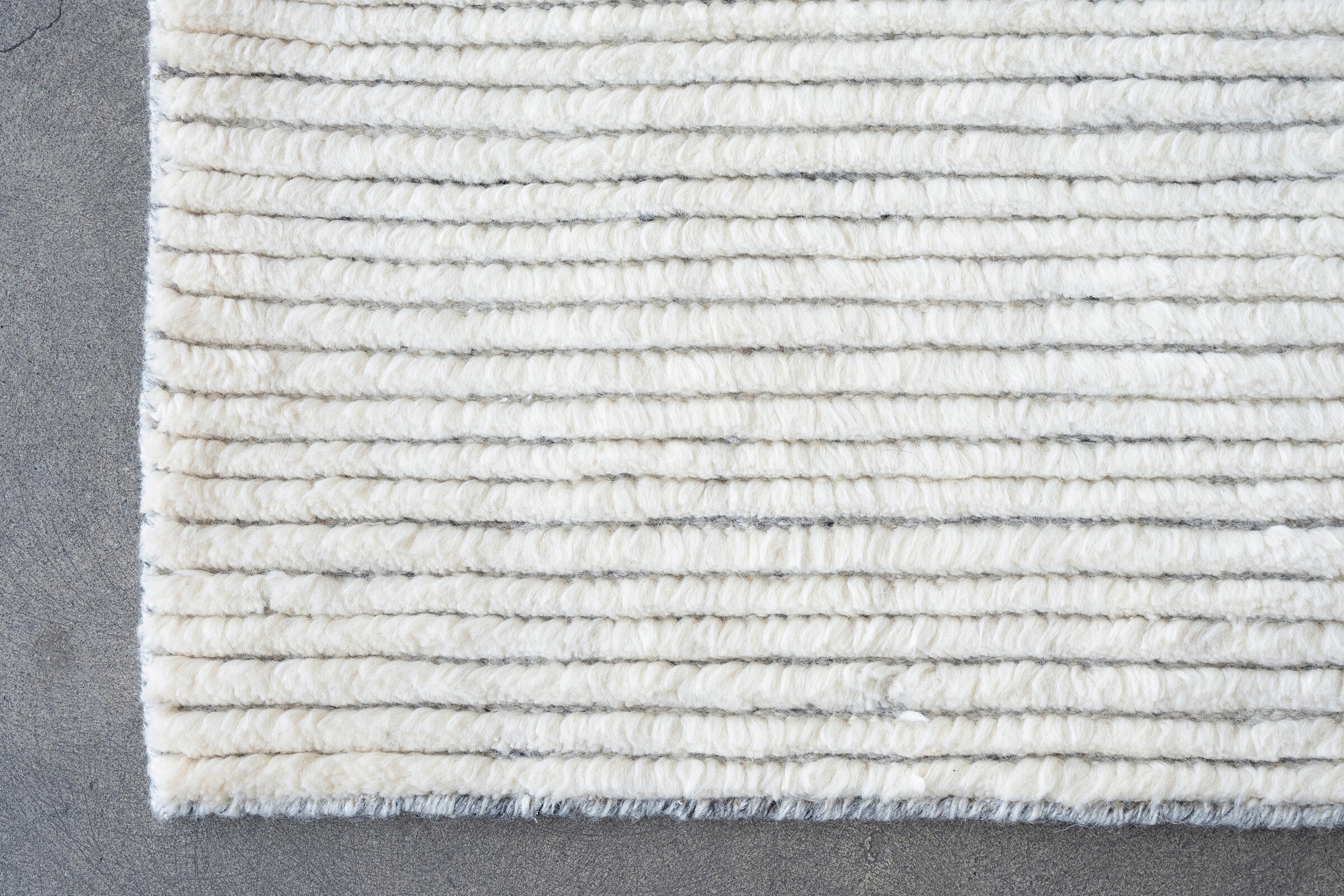 WOOL TULU - IVORY/SILVER rug from the wool tulu series by WOVEN